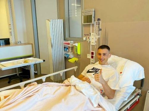 Robert Bozenik in the hospital after the surgery